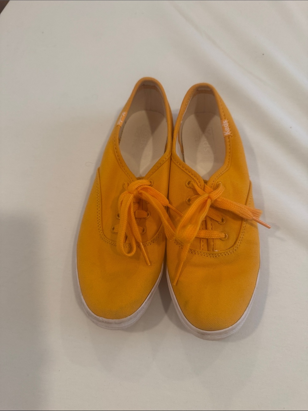 Keds women’s Canvas Lace-Up Sneakers in Yellow